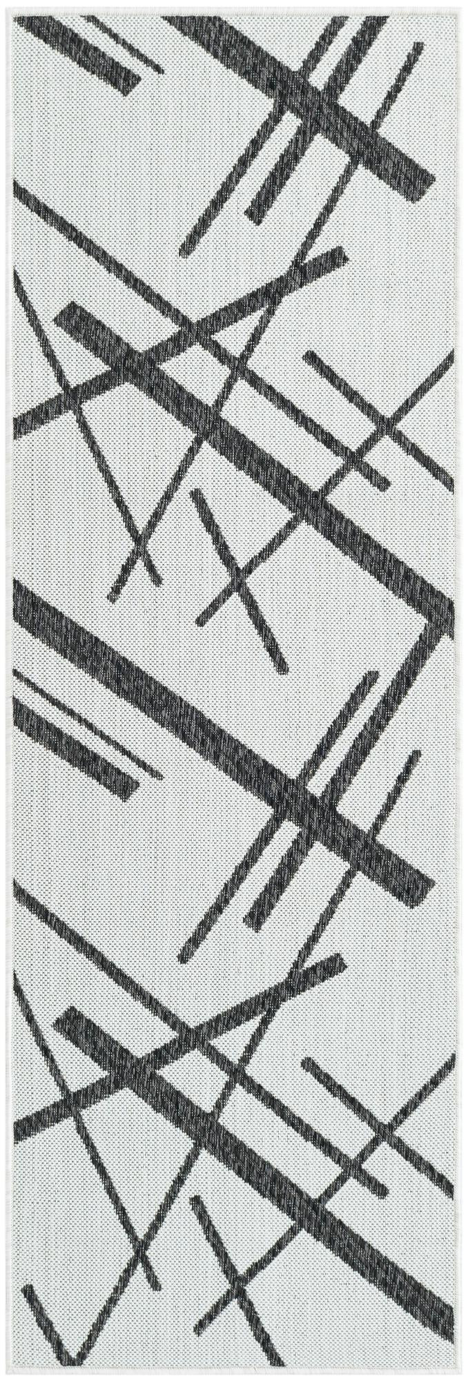 2' x 6' Saffron · Abstract Outdoor Rug, black and white