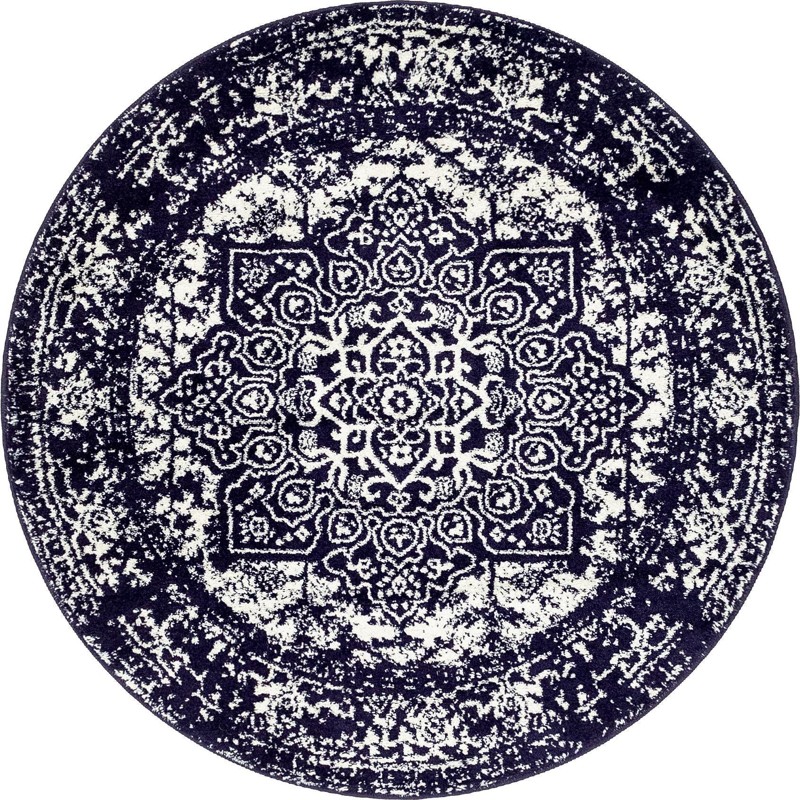 Birch · Distressed medallion rug, navy and ivory