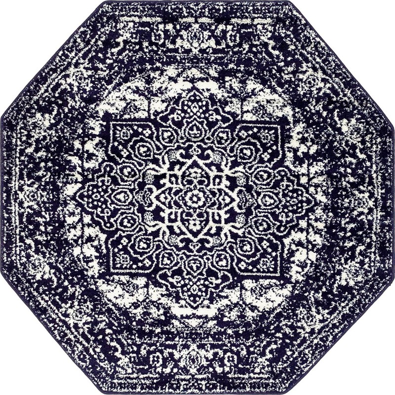 Birch · Distressed medallion rug, navy and ivory