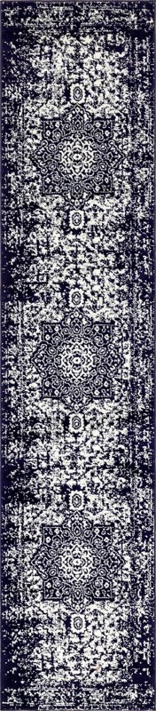 Birch · Distressed medallion rug, navy and ivory