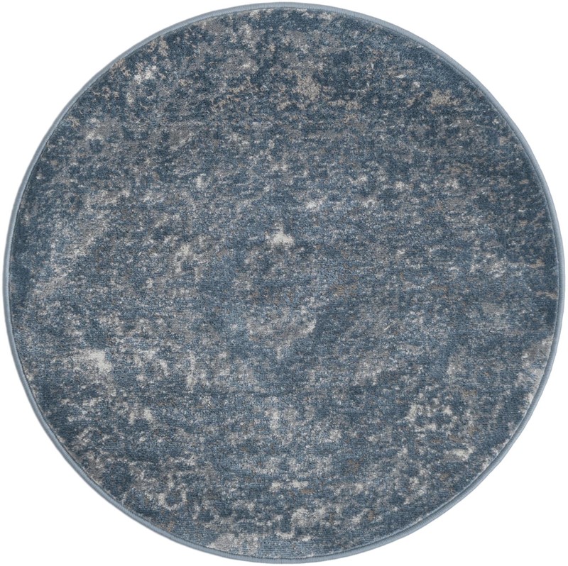 Priestley · Distressed medallion rug, blue and ivory