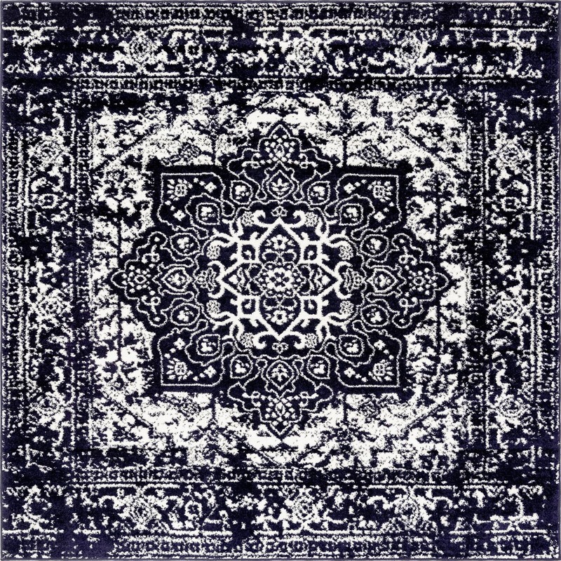 Birch · Distressed medallion rug, navy and ivory