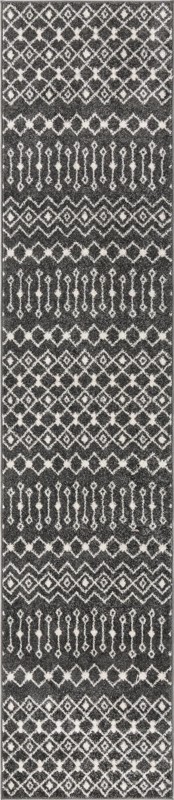 Boswell · Geometric tribal rug, dark gray and ivory
