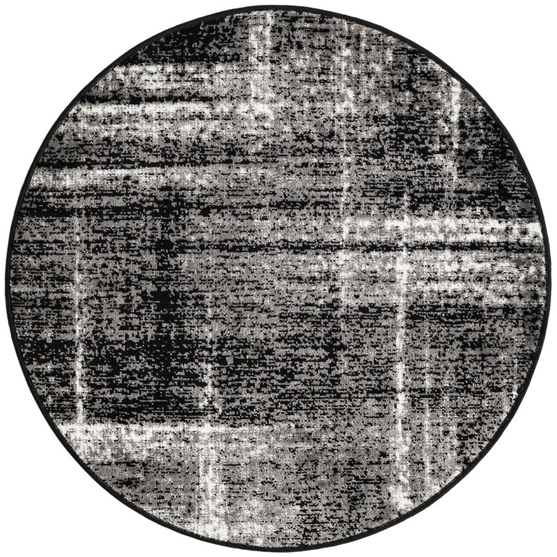 3' x 3' Rudd · Abstract rug, black
