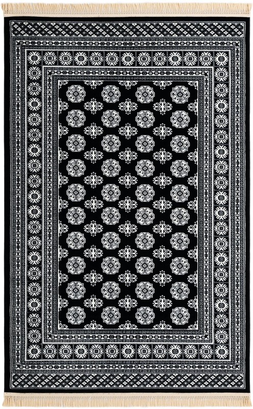 5' 3 x 8' Pitcairn · Geometric medallion rug, black and ivory