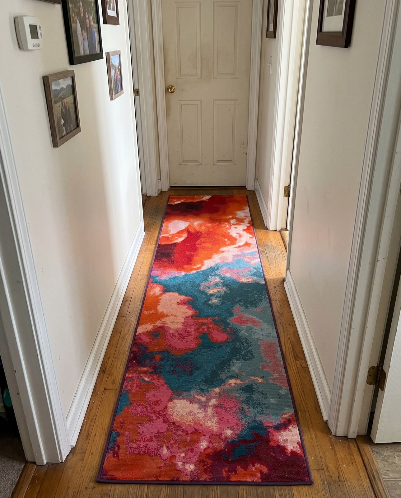Detail image of 2' 7 x 12' Lomax · Abstract Outdoor Rug, orange and blue