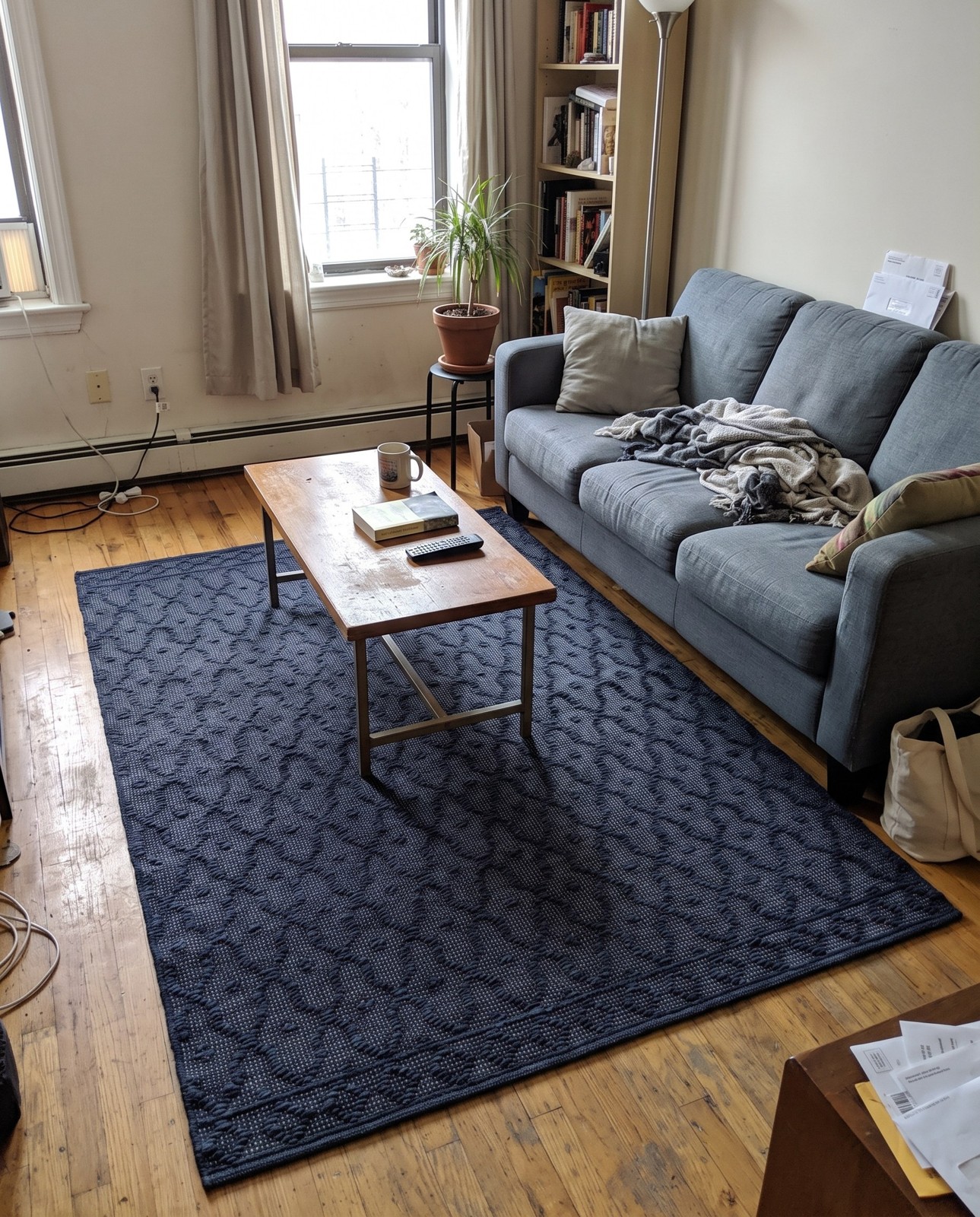 5' 3 x 8' Ringwood · Border rug, navy blue