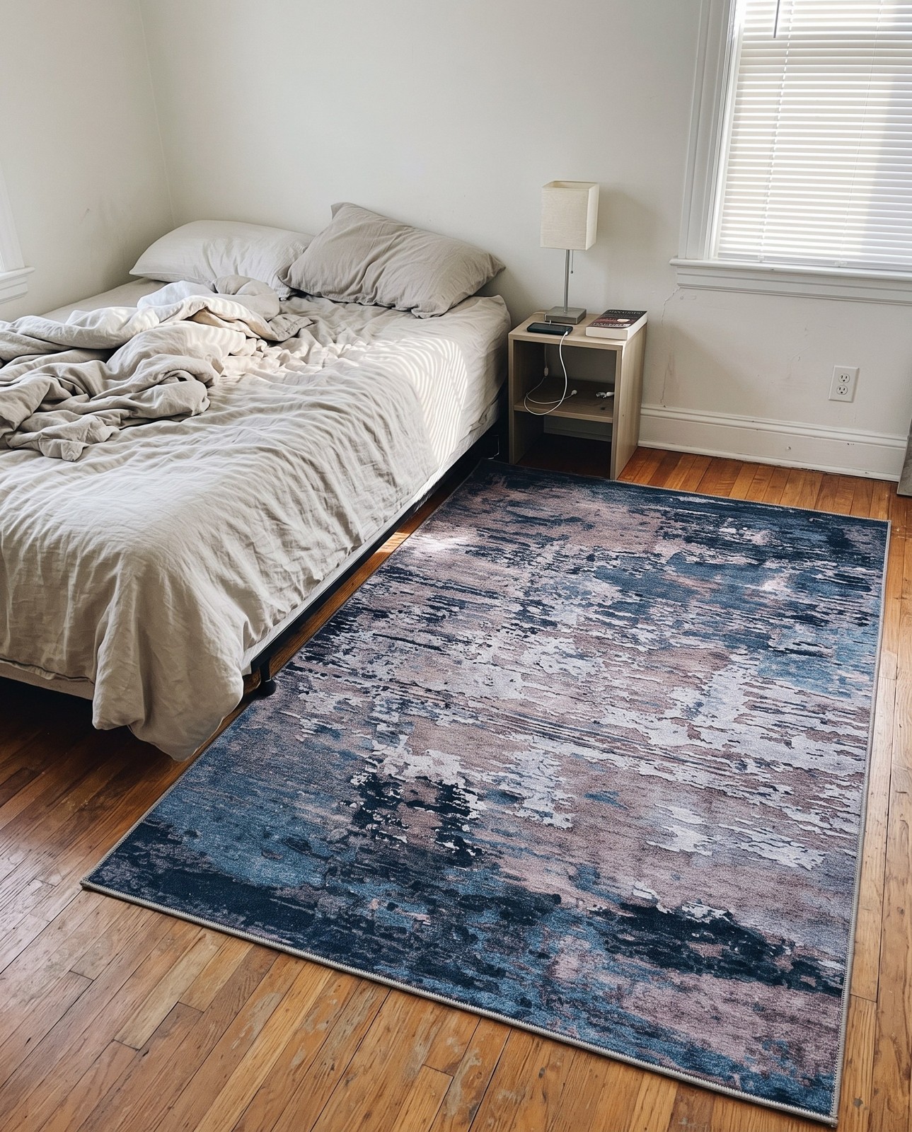 Detail image of 5' 3 x 8' Hyde · Abstract rug, navy and beige
