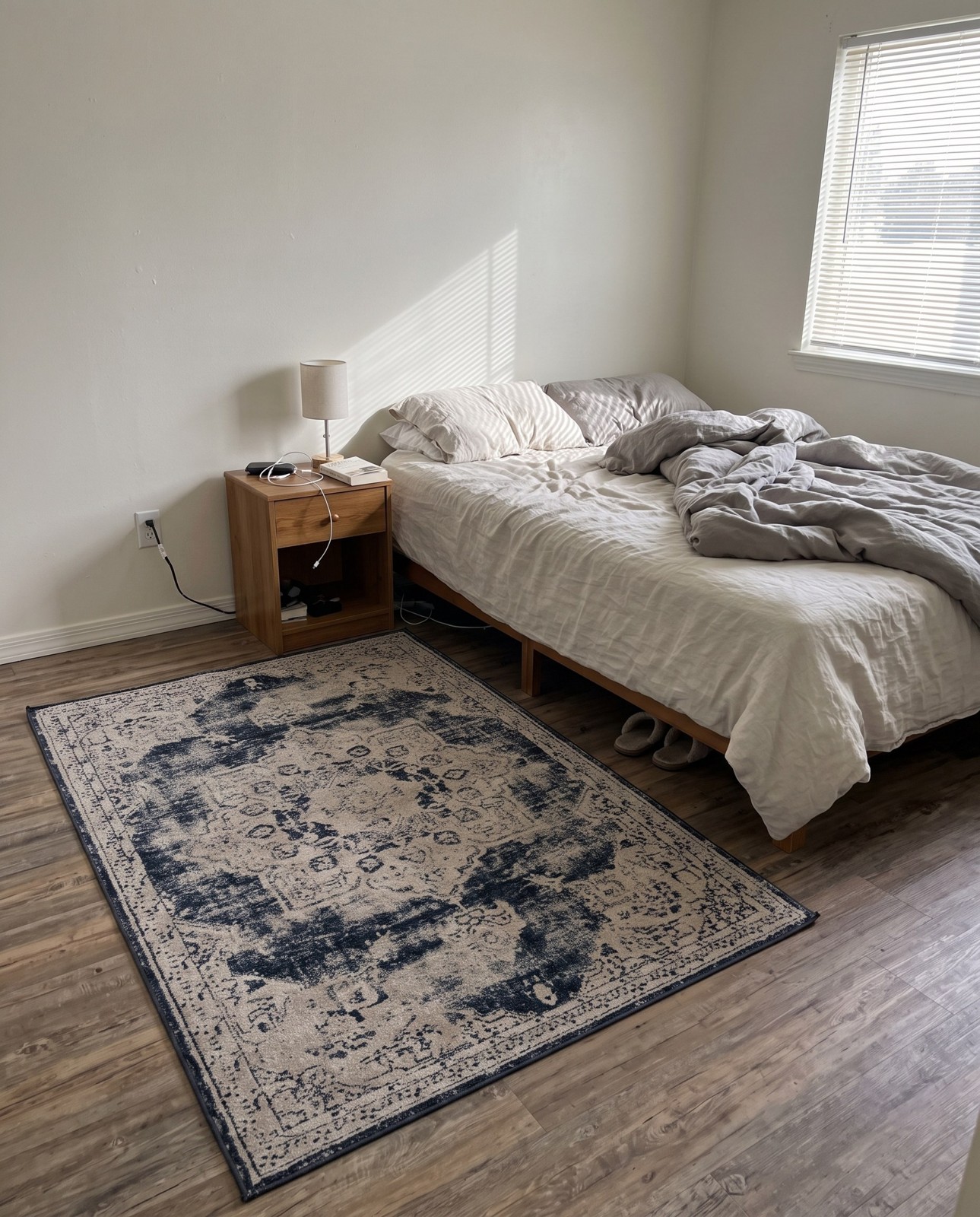 6' x 9' Todd · Distressed medallion rug, navy and beige