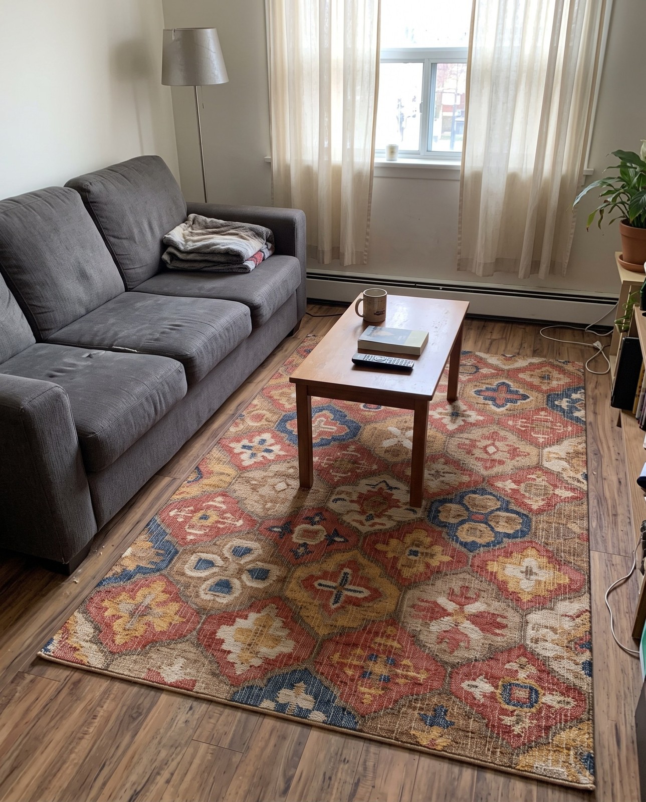 5' 1 x 8' Bolling · Tribal medallion rug, rust and gold
