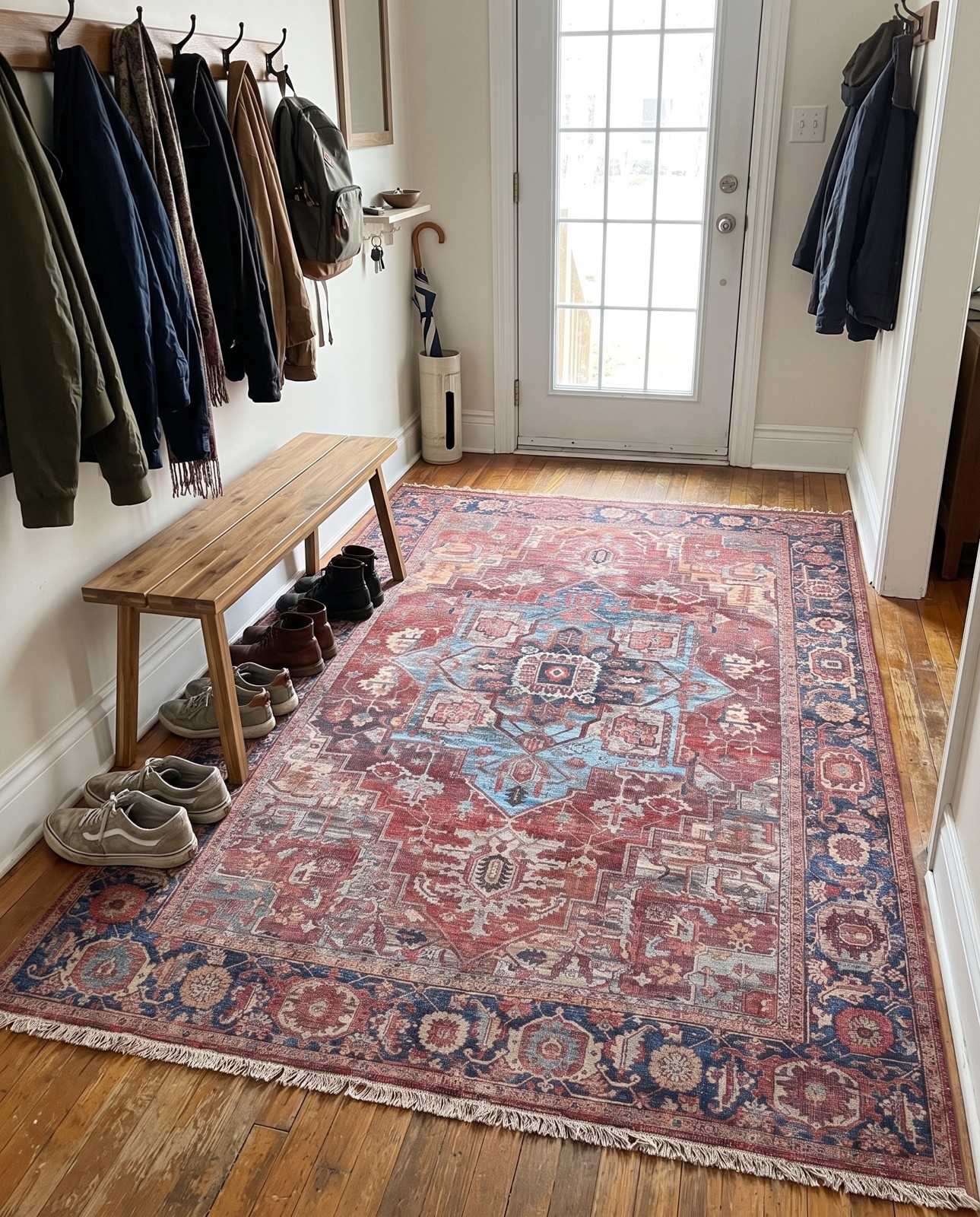 7' 10 x 11' Rathbone · Medallion rug, rust and blue