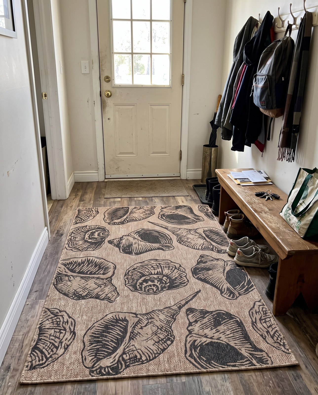 5' 3 x 8' Arcata · Pictoral Outdoor Rug, brown and black