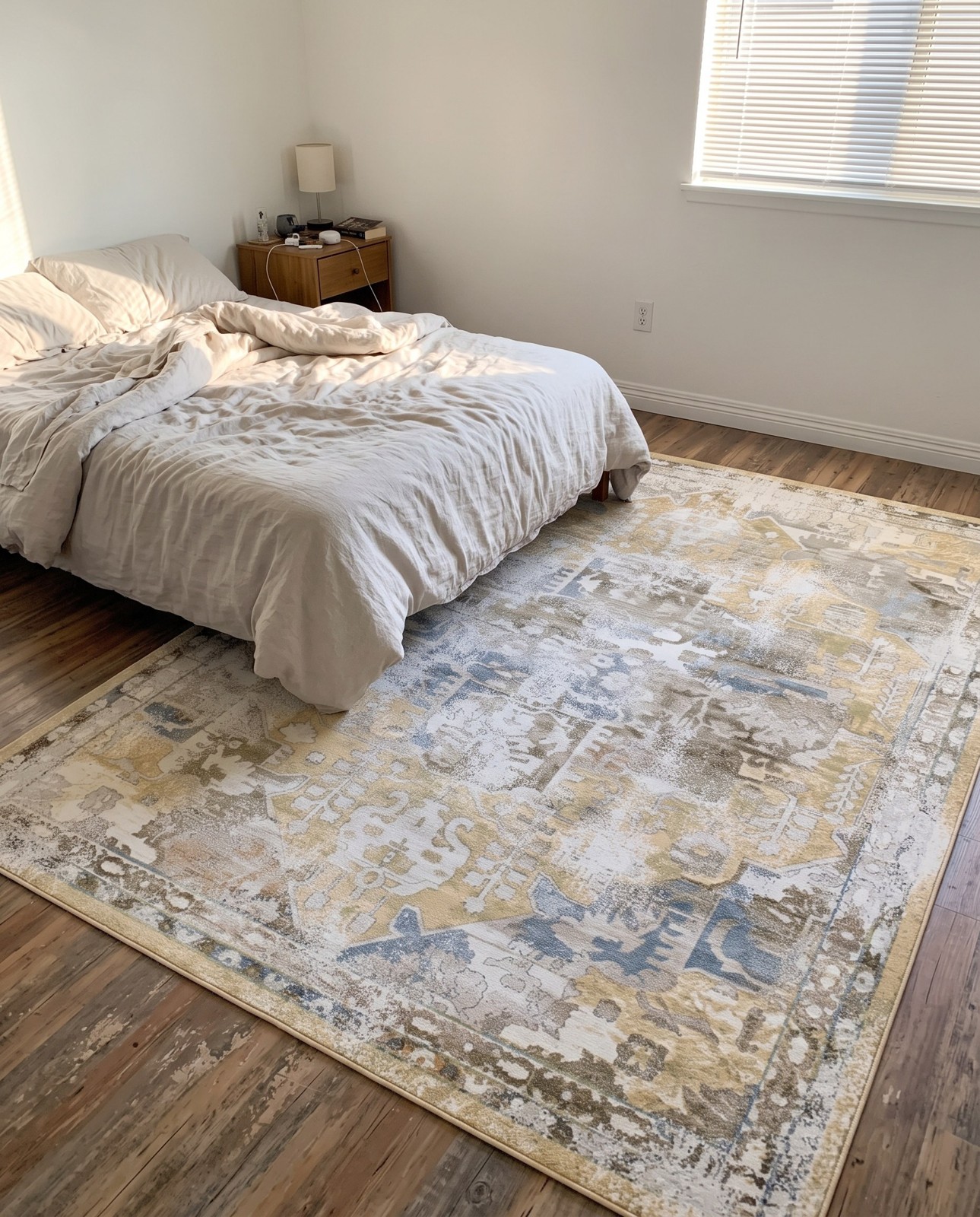 3' 3 x 5' 3 Starfield · Distressed medallion rug, yellow and ivory