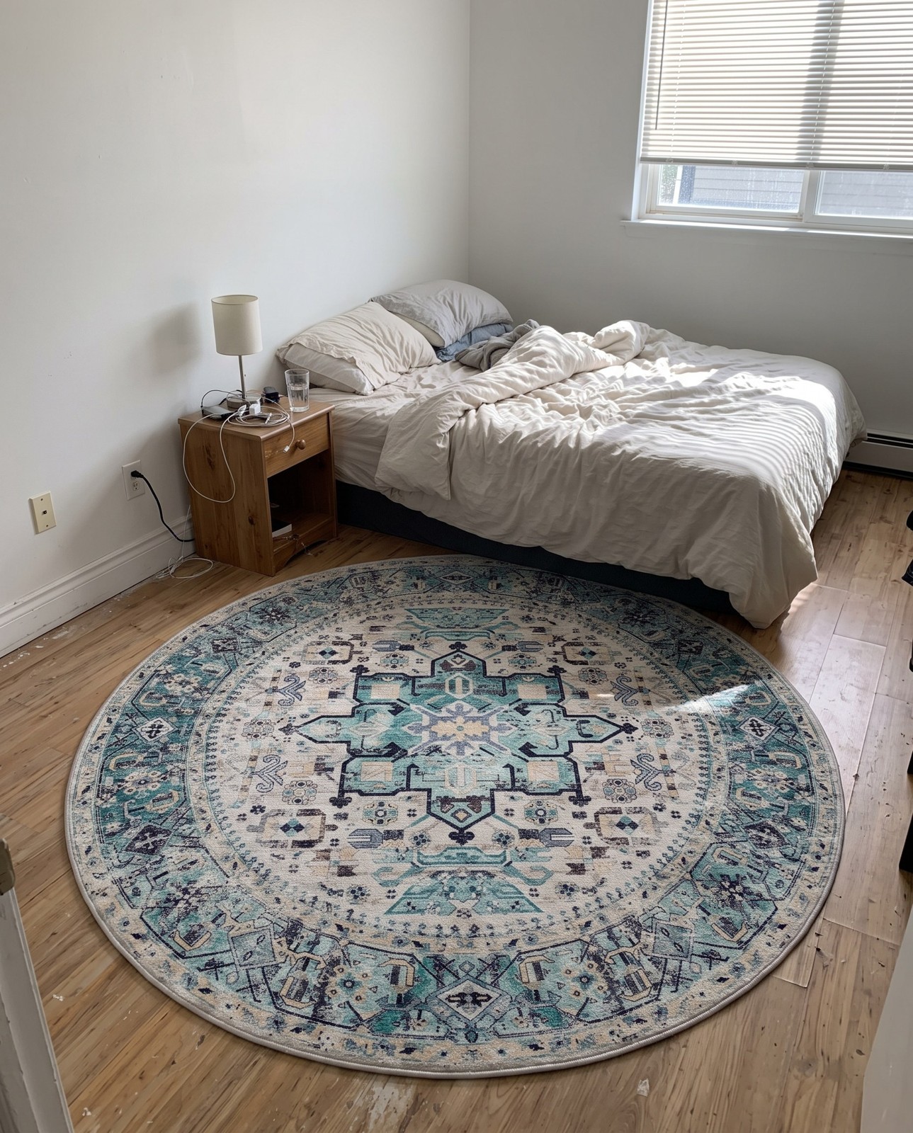 Detail image of 9' x 12' Tatlock · Medallion rug, aqua and ivory