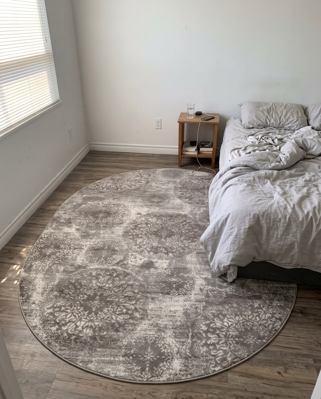 7' 10 x 10' Blakemore · Distressed medallion rug, gray and ivory