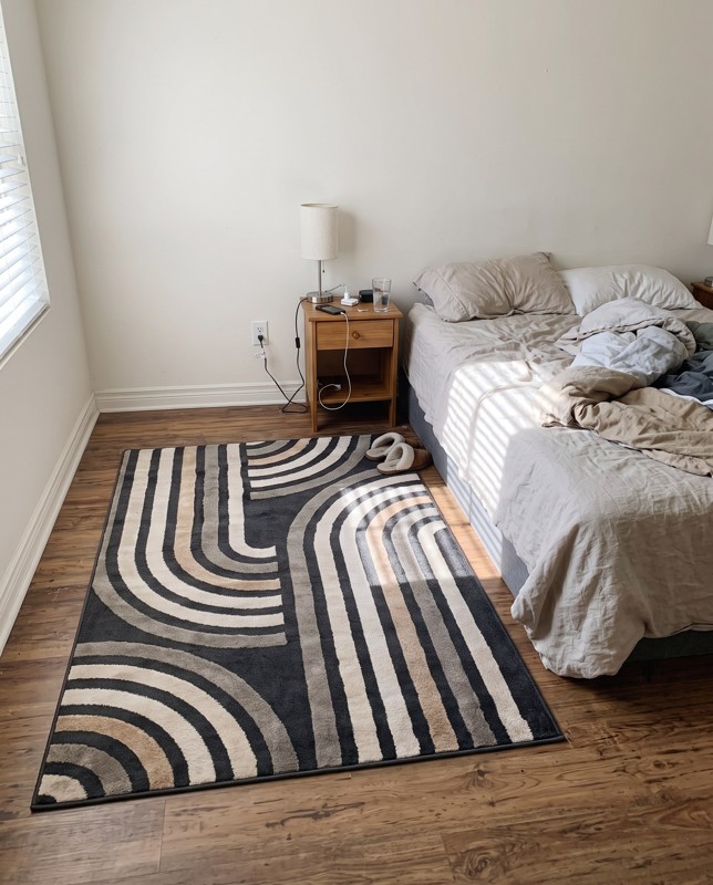 Parkes Geometric arch rug, charcoal and beige, 4×6, in a room