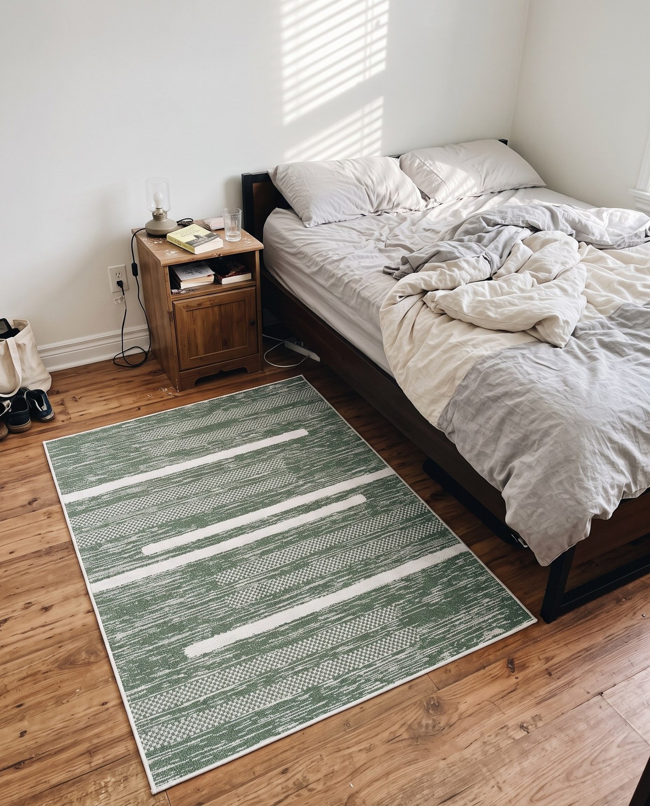 4' 5 x 6' Hornsby · Abstract striped rug, green and ivory
