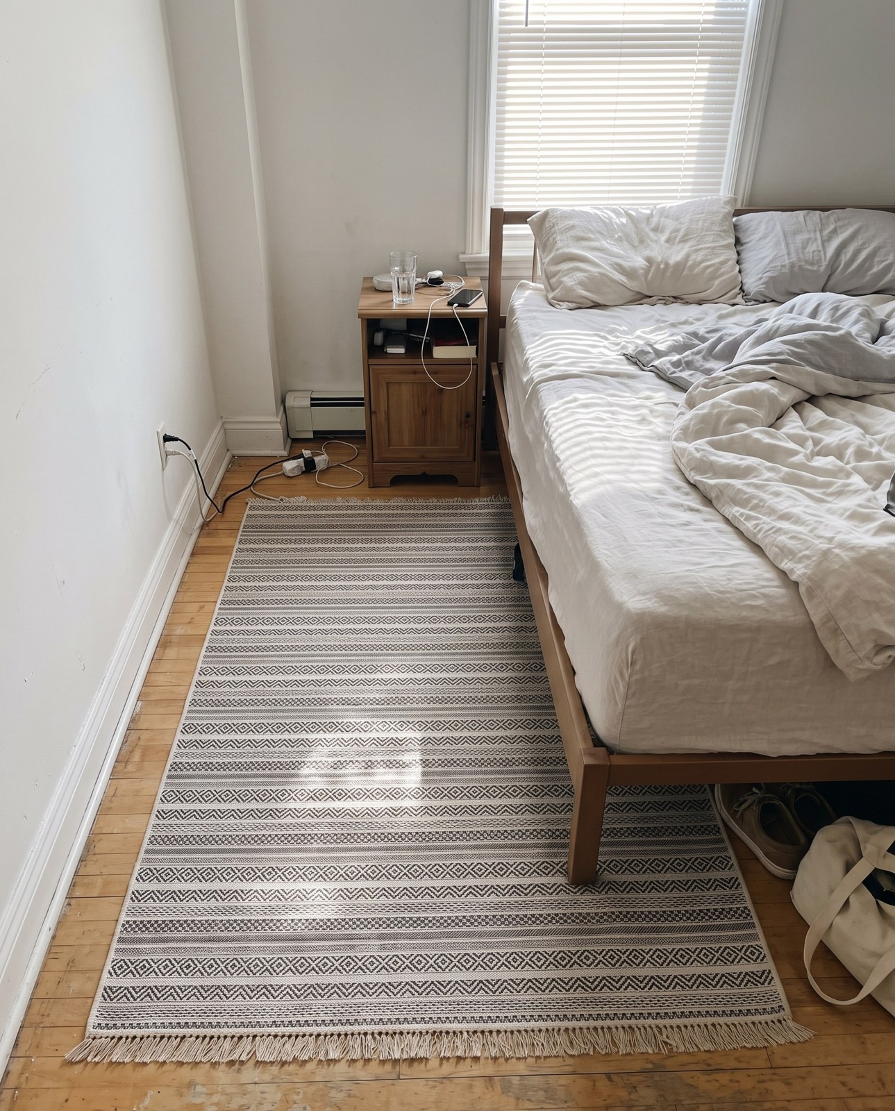 Detail image of 5' 3 x 8' Merlin · Striped geometric Outdoor Rug, beige and black