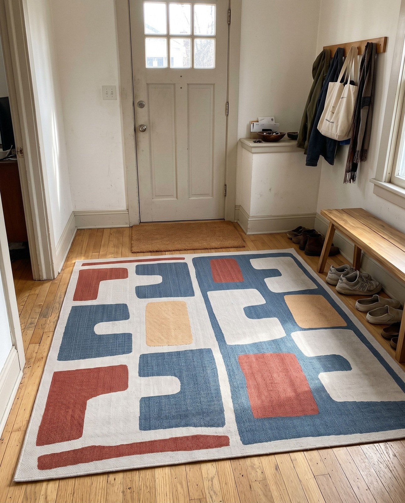 10' x 10' Wainwright · Abstract geometric Outdoor Rug, blue and rust
