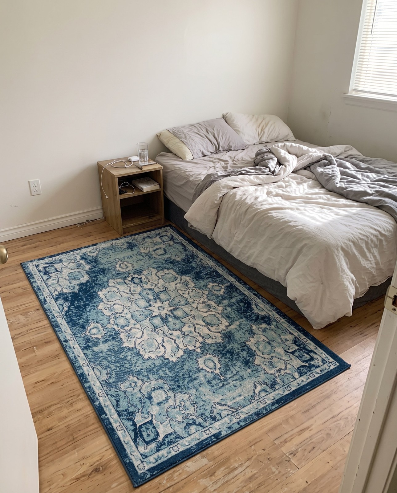 3' 3 x 5' 3 Nettle · Distressed medallion rug, blue and ivory