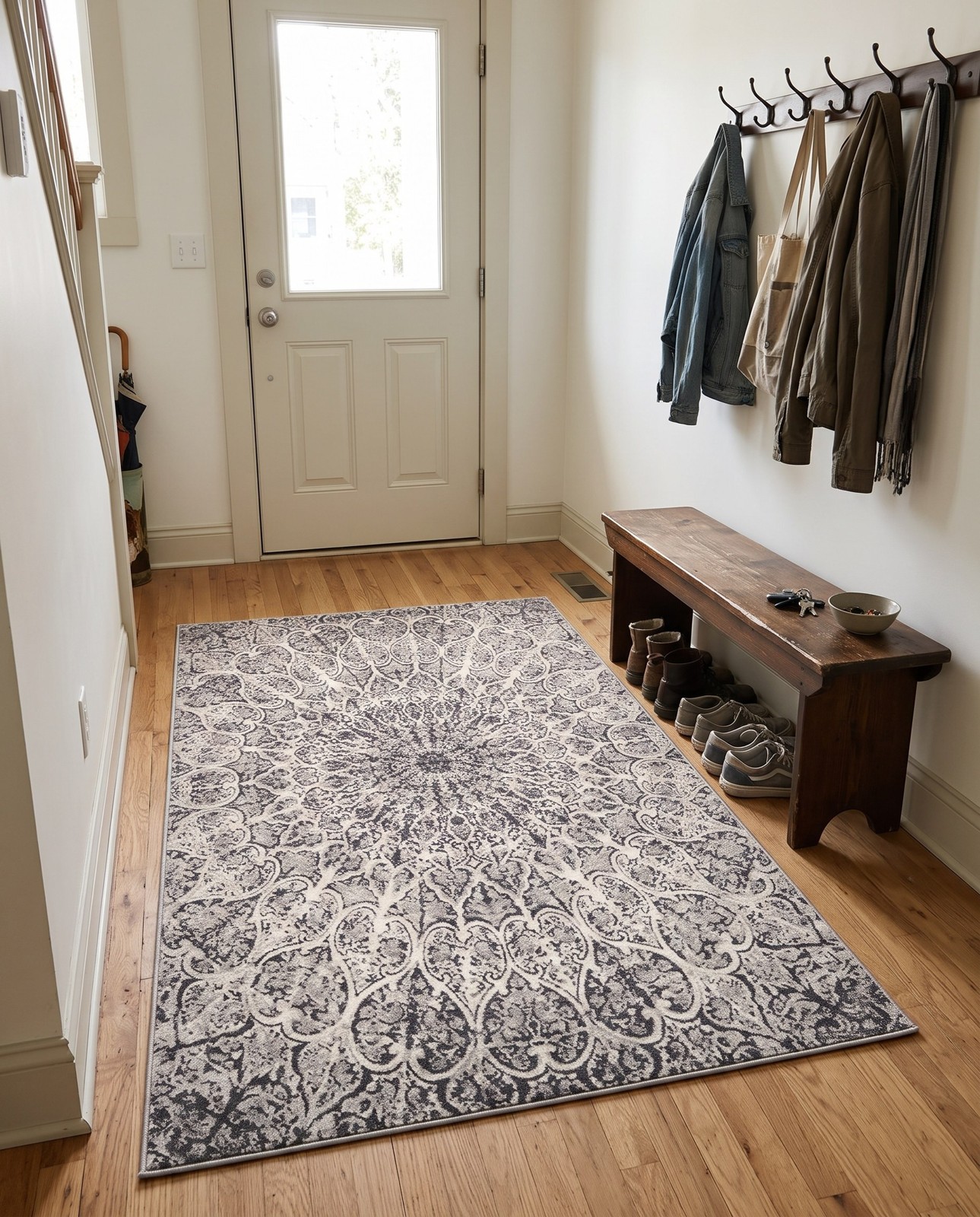 7' 10 x 11' Blakemore · Medallion rug, dark gray and ivory