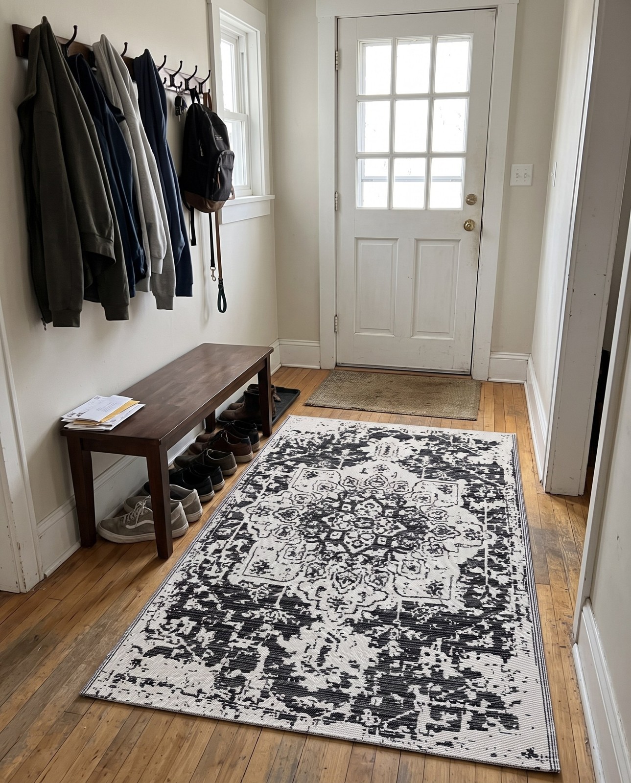 Detail image of 5' x 8' Millet · Medallion Outdoor Rug, black and white