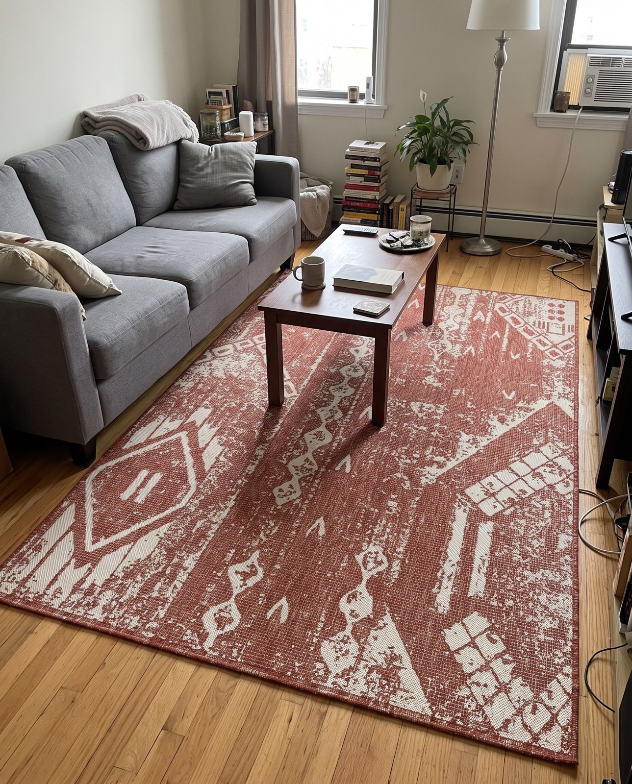 6' x 9' Wildman · Chevron Outdoor Rug, rust red