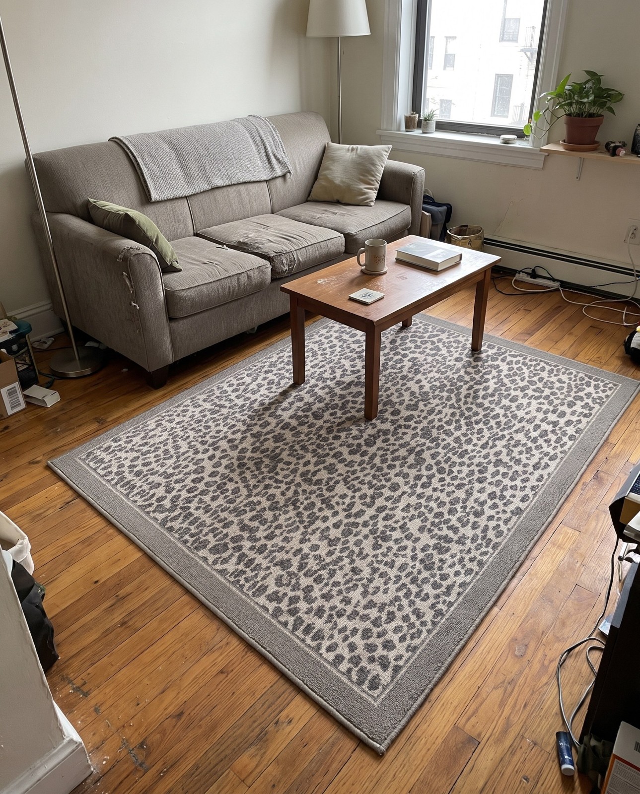 5' x 5' Butte · Leopard print rug, gray and taupe