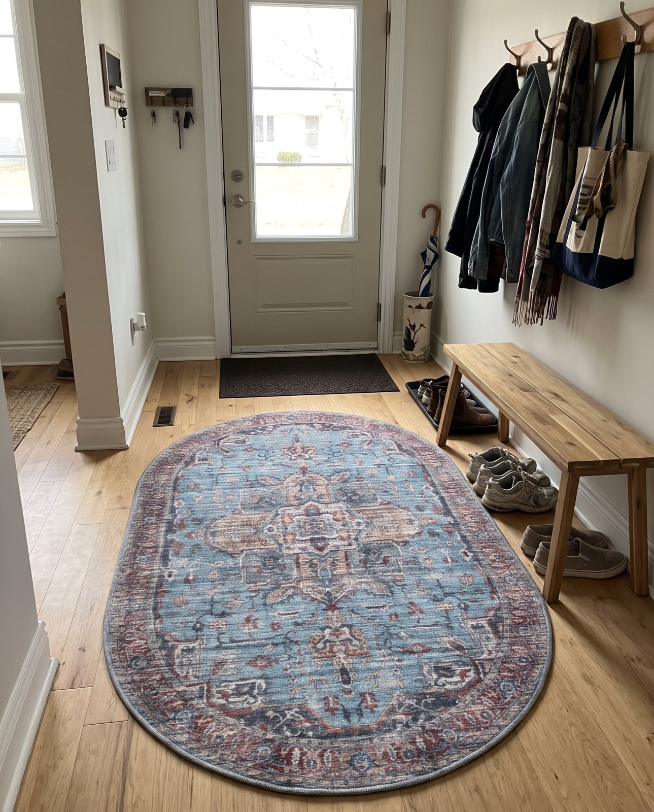 7' 10 x 11' Roarke · Distressed medallion rug, blue and rust