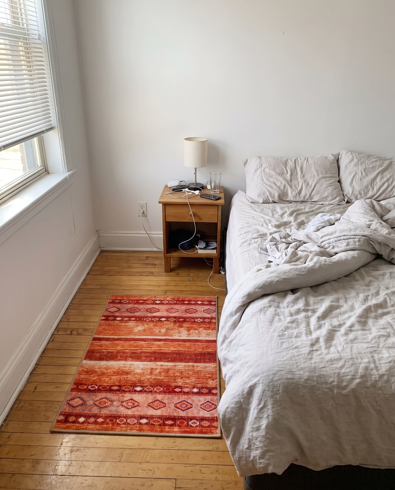 2' x 3' Dalton · Tribal striped Washable Rug, rust and orange