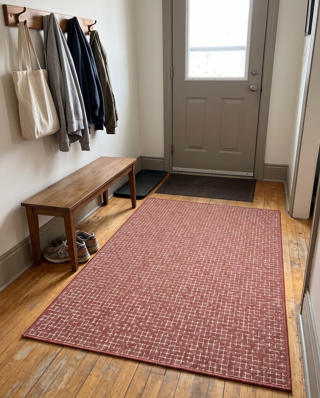 9' x 12' Loam · Geometric Outdoor Rug, rust red