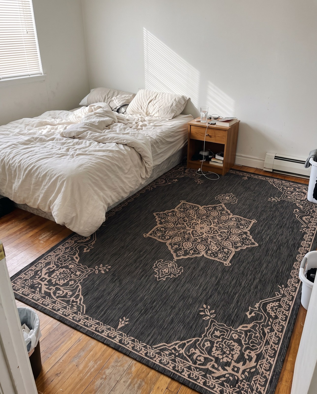 Detail image of 7' 10 x 11' Rhys · Border Outdoor Rug, charcoal