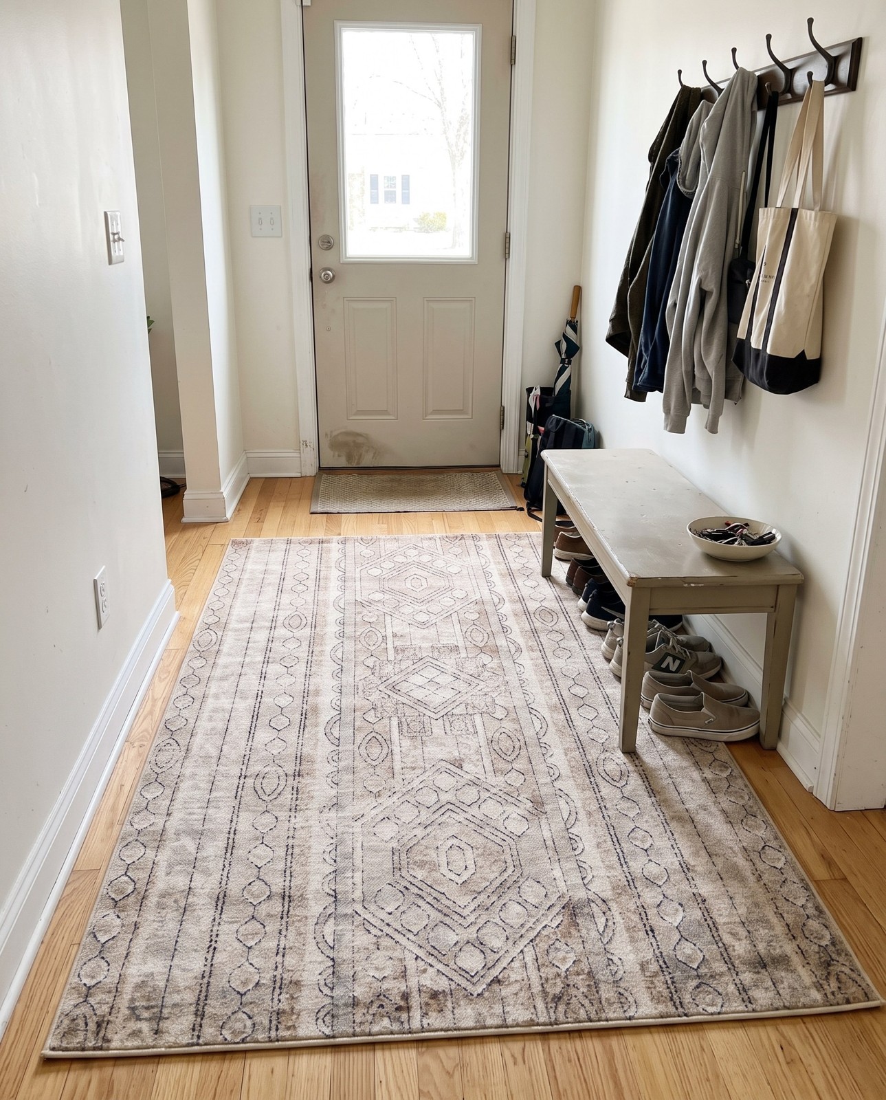5' 3 x 8' Grouse · Tribal geometric rug, ivory and brown