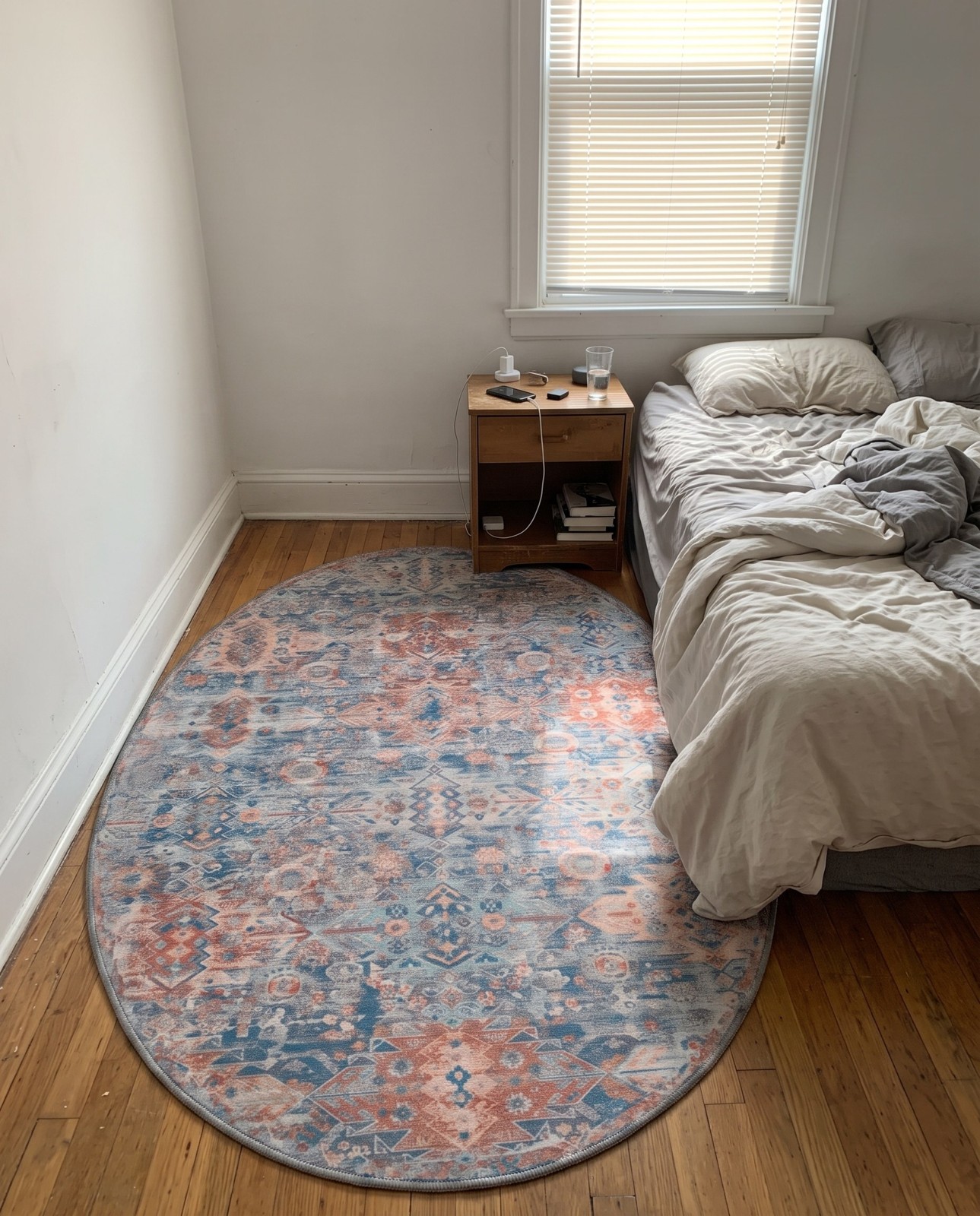 7' 7 x 10' 6 Waters · Geometric medallion Washable Rug, blue and rust
