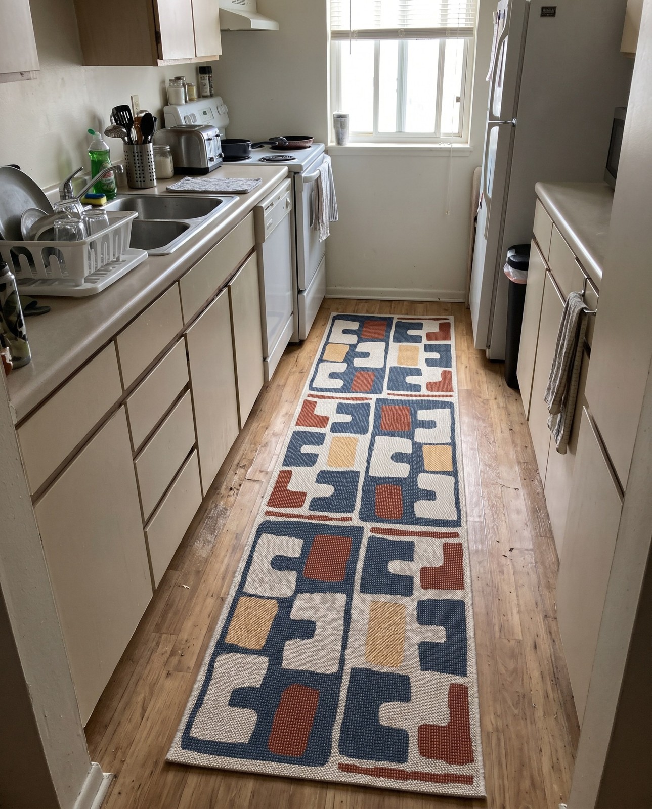 2' x 6' 1 Wainwright · Abstract geometric Outdoor Rug, blue and rust