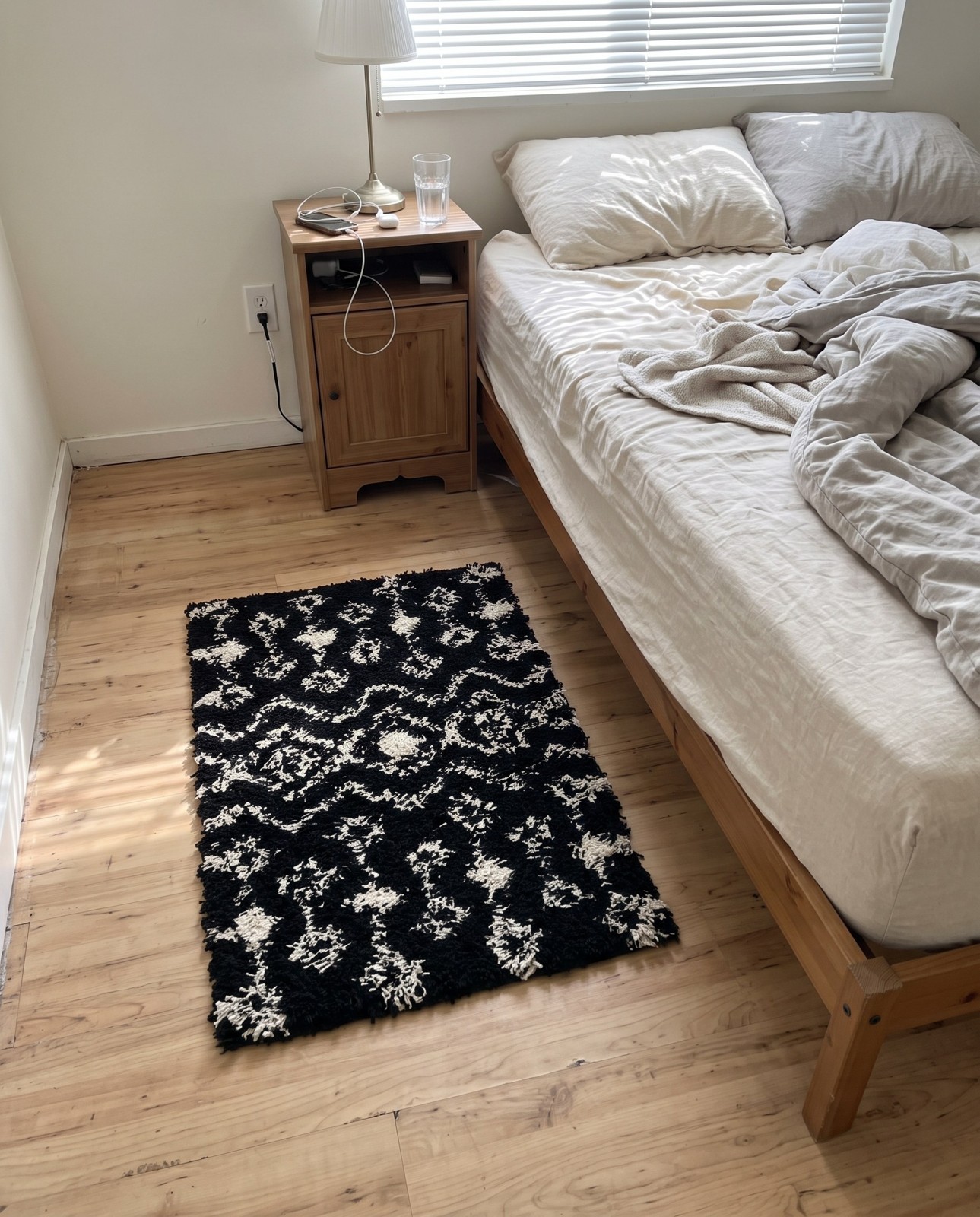 2' x 3' Bayley · Geometric shag rug, black and cream