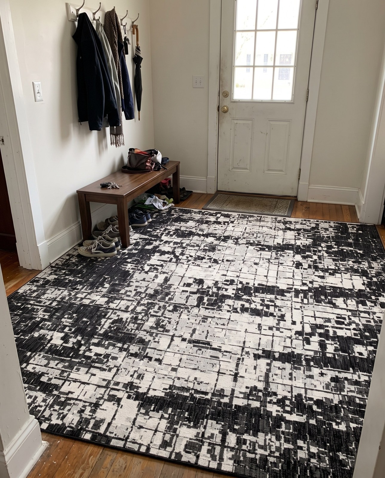 7' x 10' Rigby · Abstract Outdoor Rug, black and white