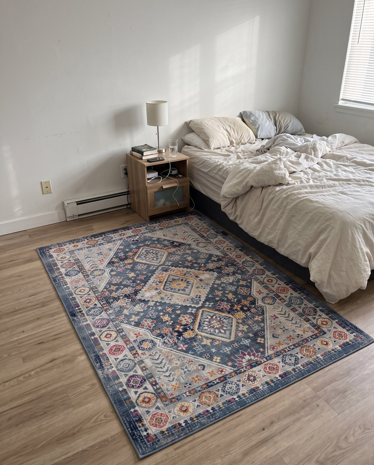 3' 7 x 5' 3 Eads · Border rug, blue