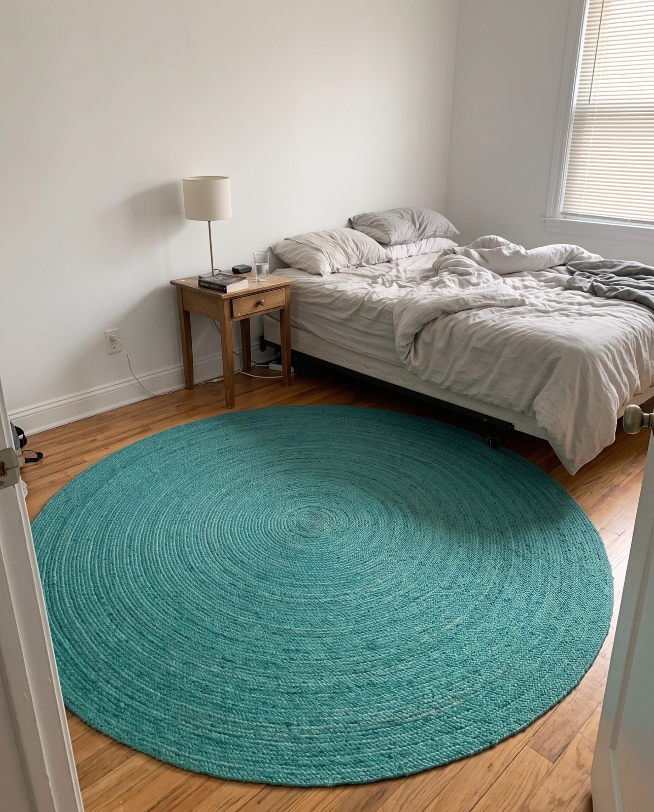 Detail image of 8' x 8' Marlin · Solid braided Braided Jute Rug, turquoise