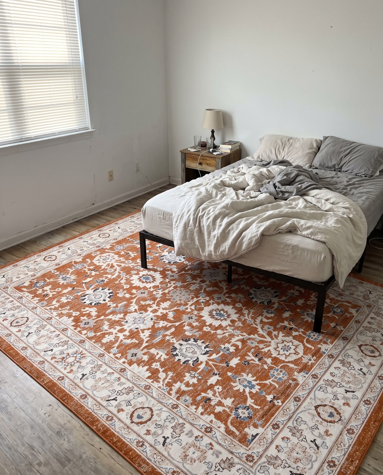 10' x 13' Reuben · Floral rug, rust and beige