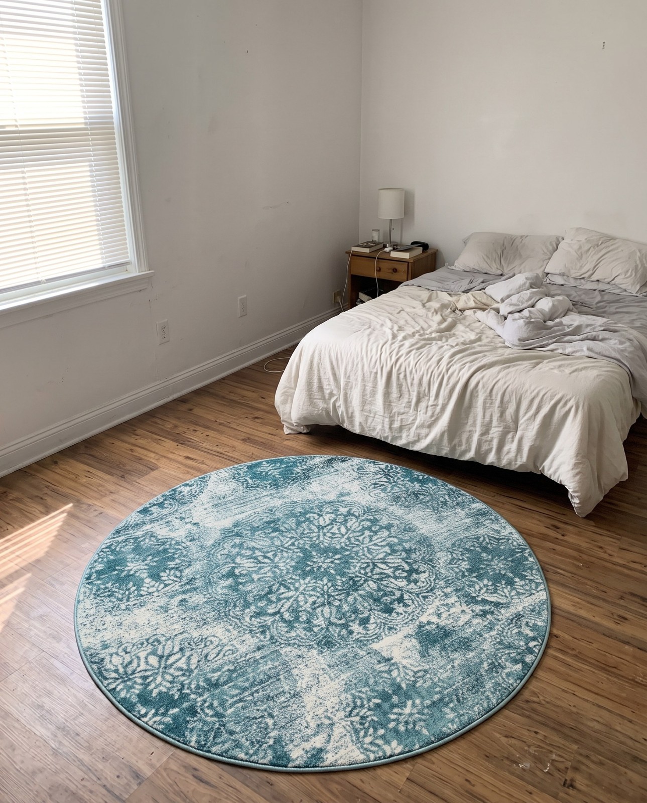 7' x 7' Blakemore · Distressed medallion rug, turquoise and ivory