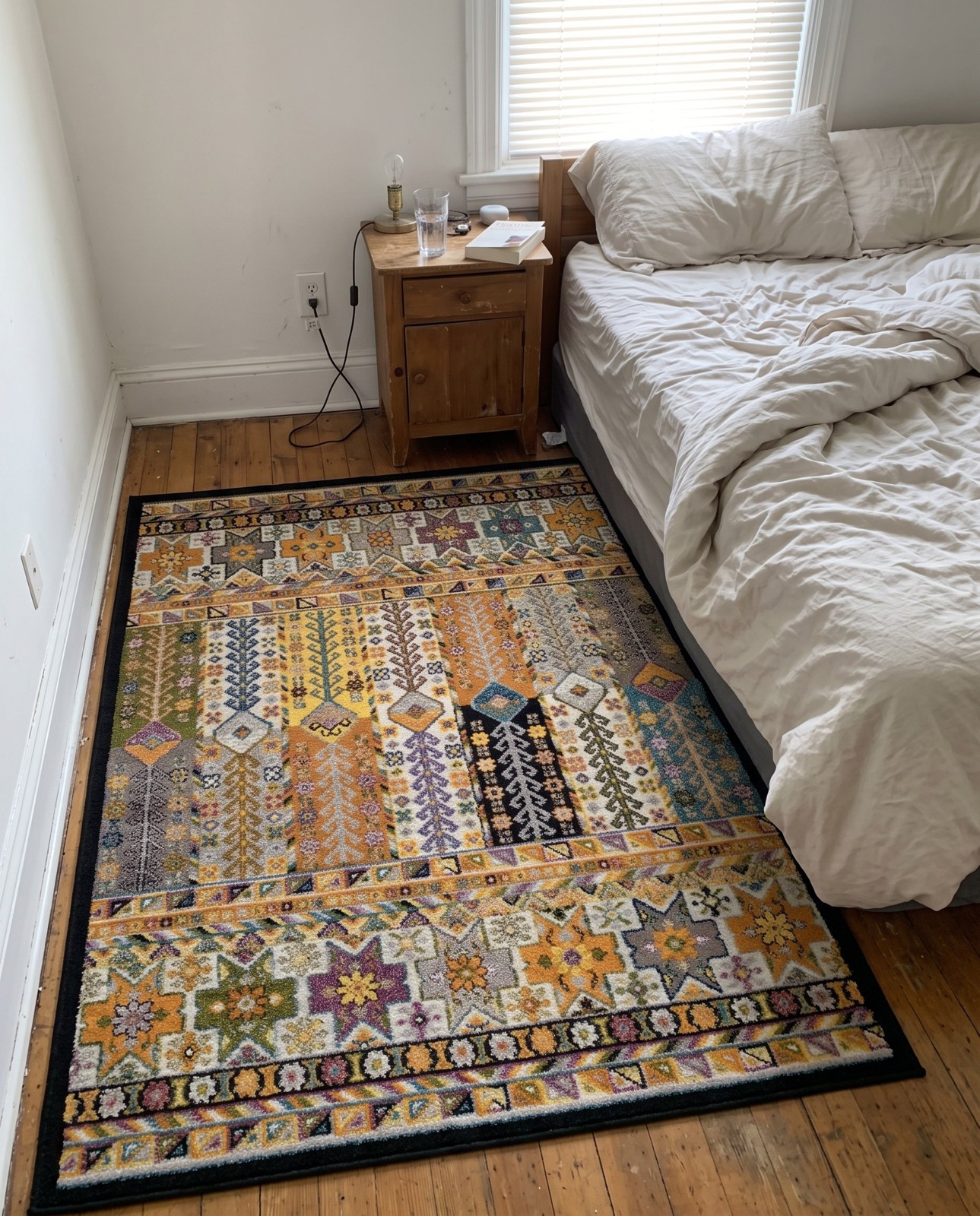 5' 3 x 8' Kestrel · Border rug, multi