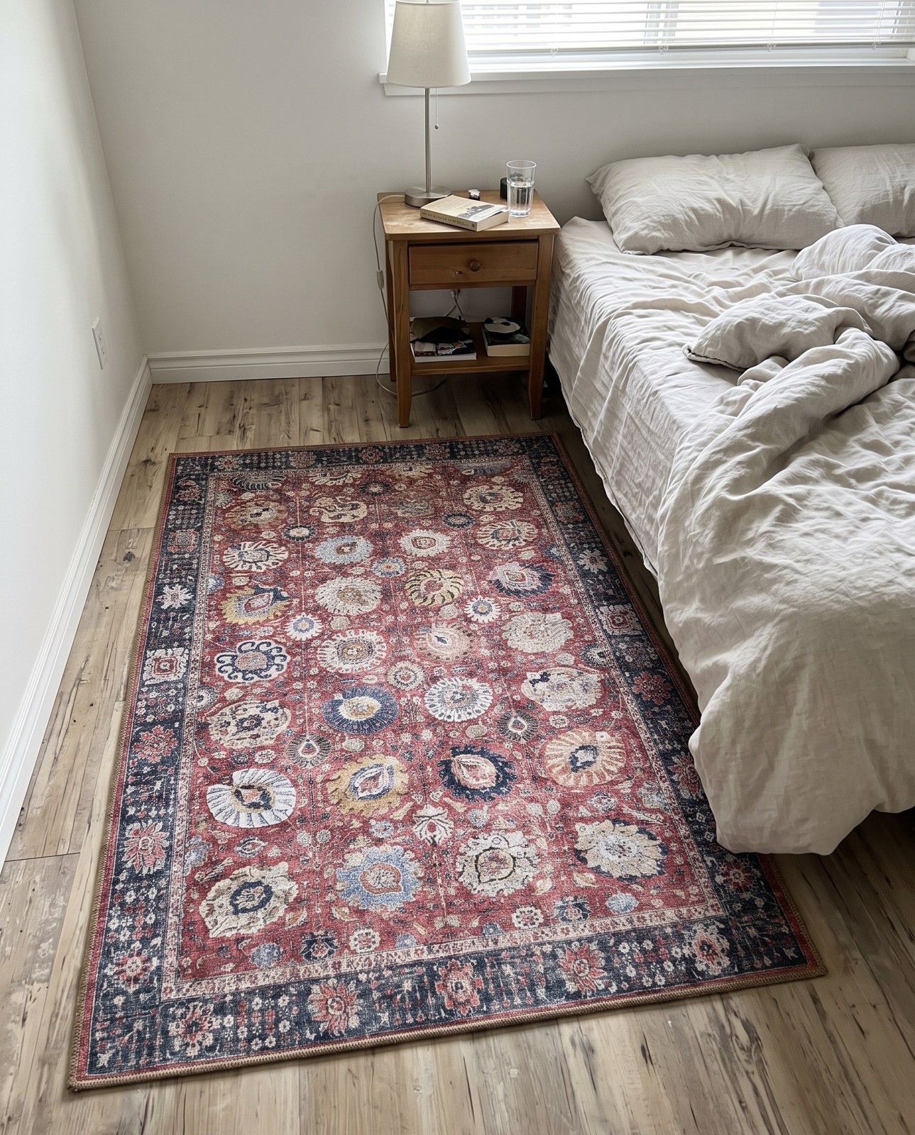 Detail image of 3' 6 x 5' 6 Barlow · Border Washable Rug, vintage red