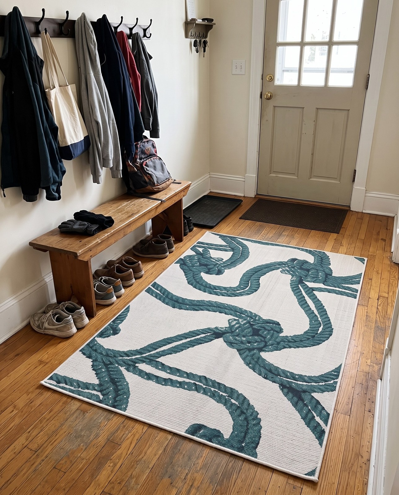Detail image of 4' x 6' Calder · Nautical rope Outdoor Rug, teal and ivory