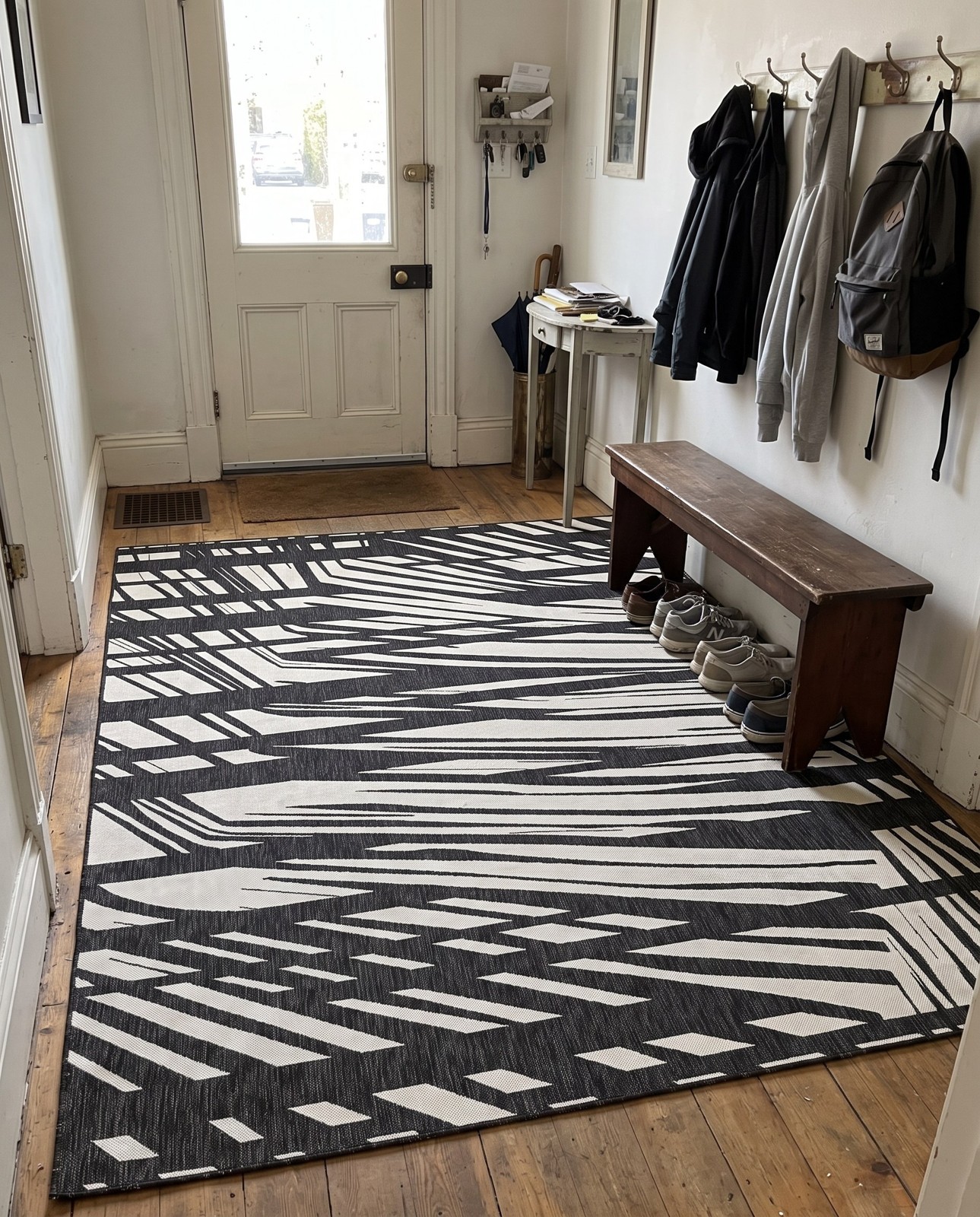 7' 10 x 10' Frasier · Abstract geometric Outdoor Rug, black and white