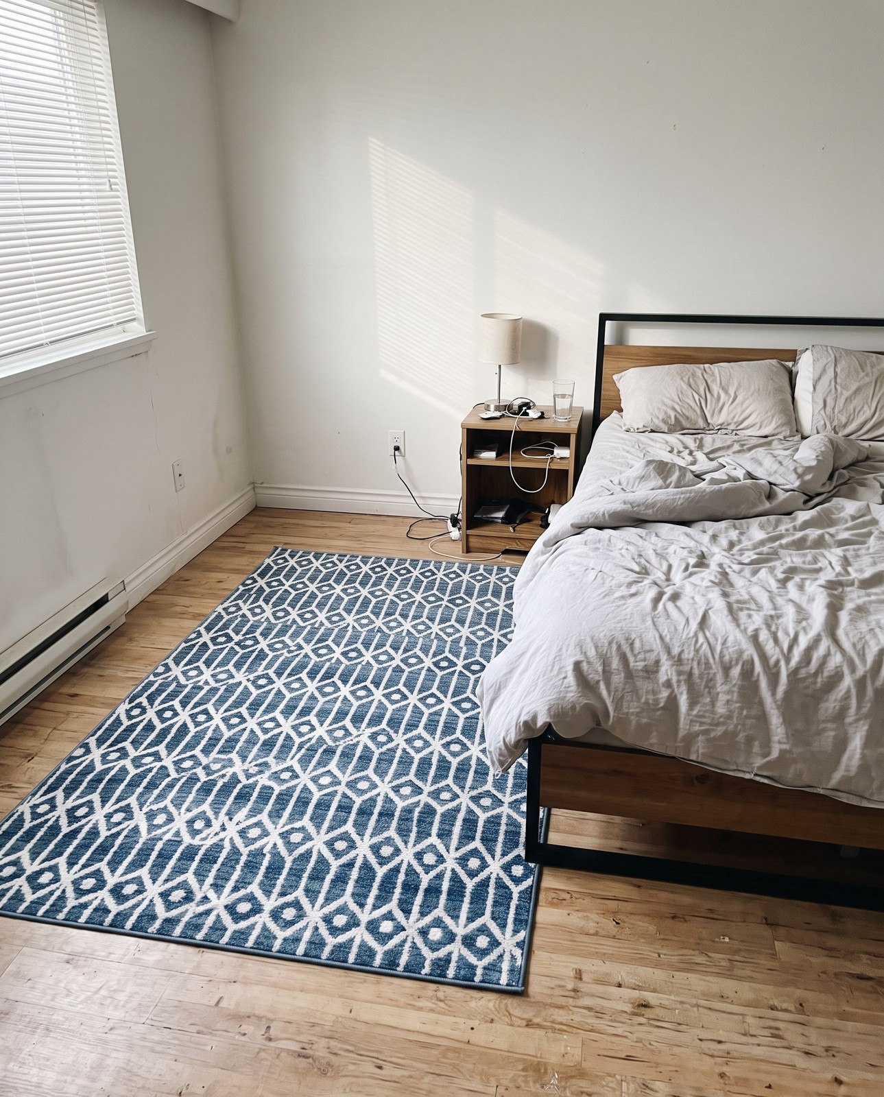 Detail image of 6' x 9' Vincent · Geometric trellis rug, blue and ivory