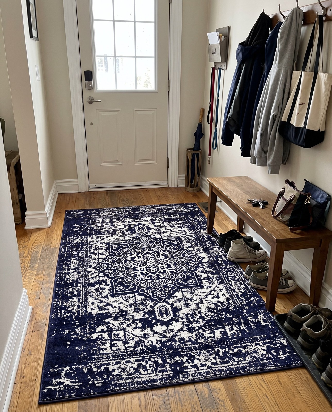 5' 3 x 8' Birch · Distressed medallion rug, navy and ivory