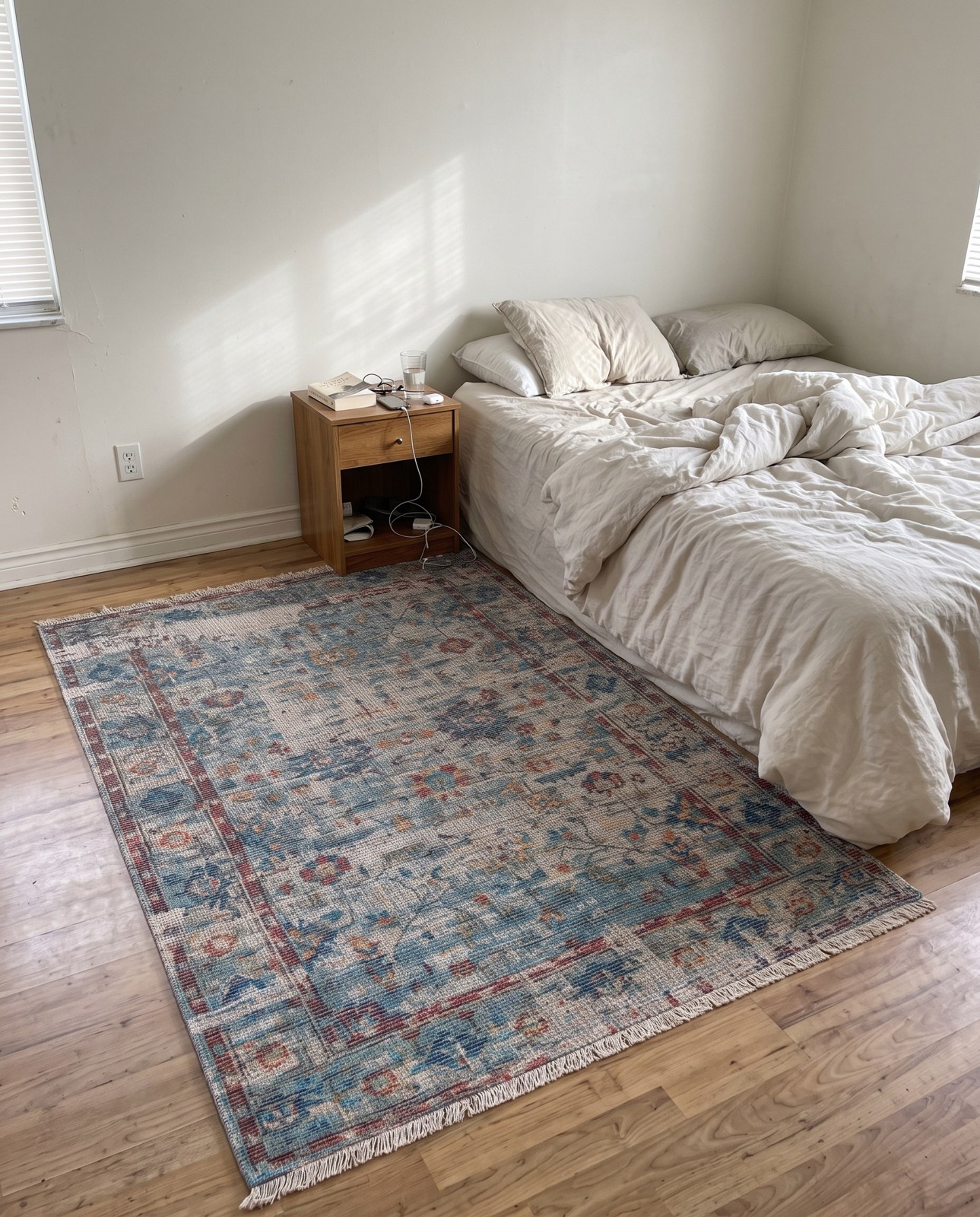 6' 1 x 9' Biloxi · Distressed medallion rug, teal and terracotta