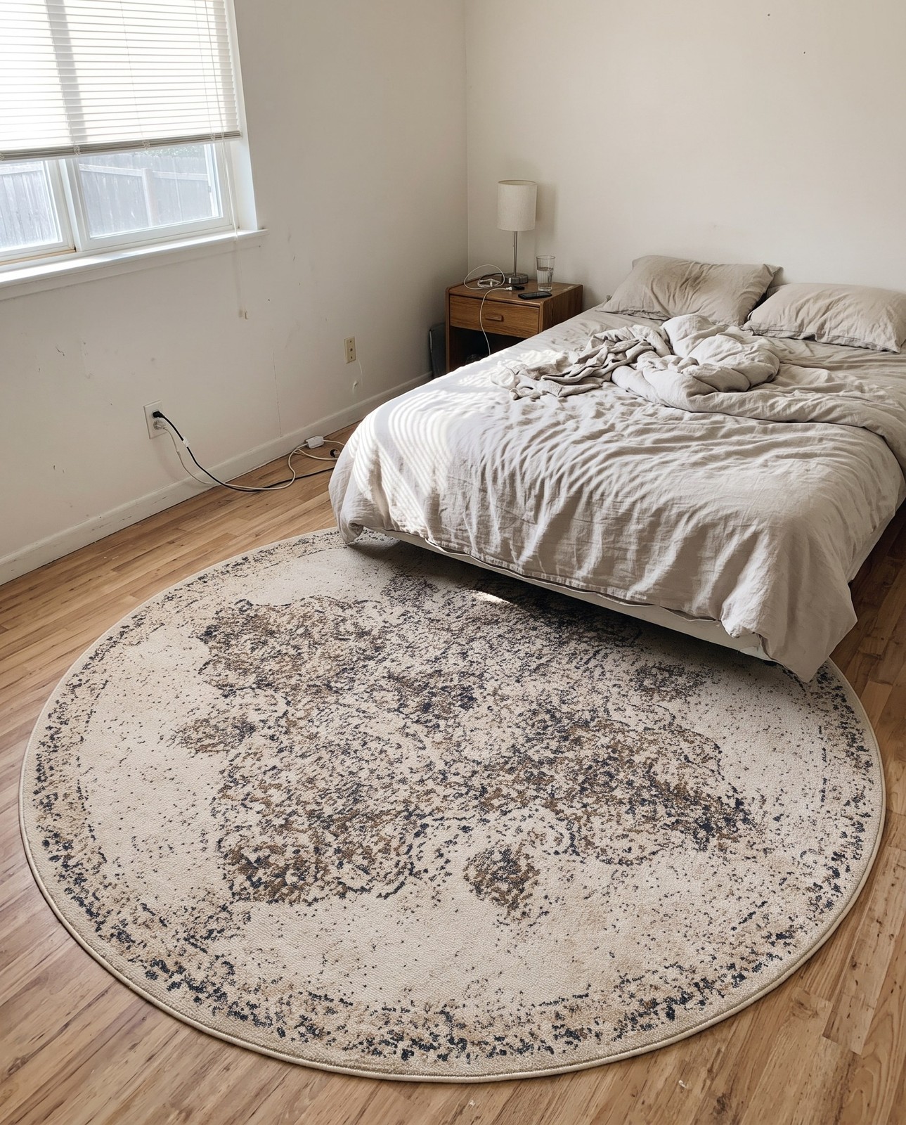 8' x 8' Maude · Distressed medallion rug, cream and brown