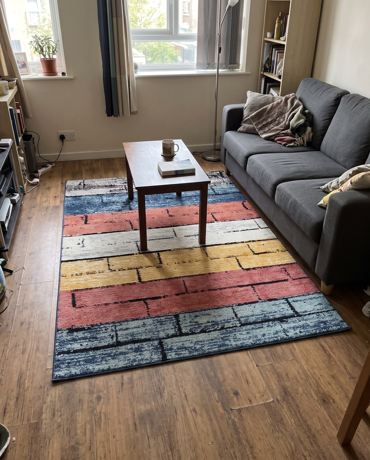 9' x 12' Gibbs · Geometric rug, multi